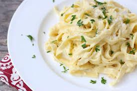 Fettuccine Alfredo · Made with our secret family Alfredo recipe.