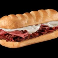New York Steamer Sub · Corned beef brisket, pastrami, melted provolone, mustard, mayo and Italian dressing.