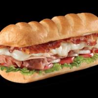 Large Club on a Sub Combo · Smoked turkey breast, Virginia honey ham, pepper bacon and Monterey Jack. Loaded completely ...