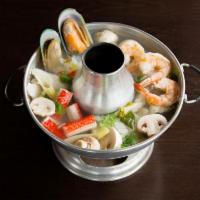 Z3. Seafood Soup · Assorted seafood in spicy soup flavored with chili, lemongrass and lime juice. Spicy.