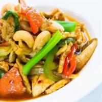 E2. Cashew Nut · Your choice of meat sauteed with cashew nuts, mushroom, dried chili, onion, and spicy sauce....