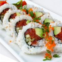 Spicy Tuna Roll · Fresh spicy tuna, avocado, cucumber and sesame seeds. Garnished with masago and green onions. 