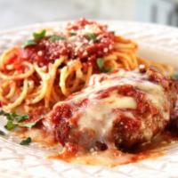 Pollo Parmigiana · Traditional-style chicken Parmigiana and spaghetti con pomodoro.