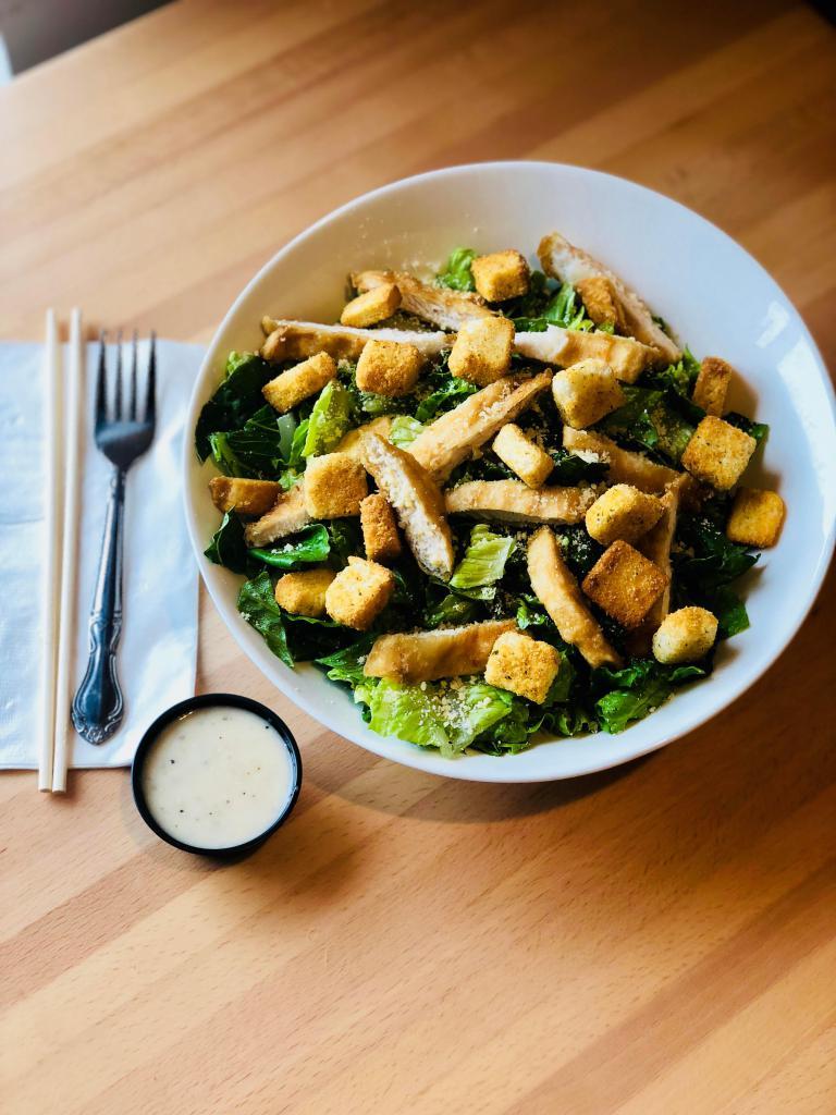 Caesar Salad · Fresh romaine lettuce topped with Parmesan, croutons and creamy Caesar dressing. Vegetarian.