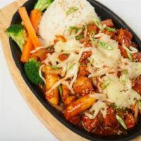 Bull Dak · Spicy chicken stir-fried with rice cakes
and Bonchon Signature Hot Sauce,
topped with thinly...