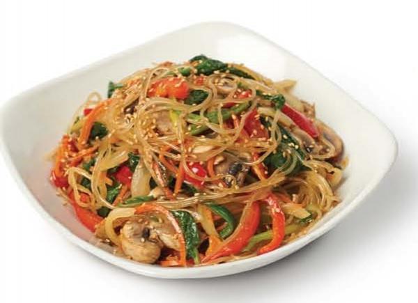 Japchae · Glass noodles, red peppers, carrots, spinach, mushrooms and thinly sliced marinated beef flavored with Bonchon soy garlic sauce and stir-fried with sesame oil.