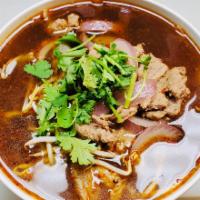 BEEF NOODLE SOUP · Home made beef broth, rice noodles, red onion, cilantro, scallions and beansprouts. 
