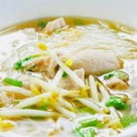 Chicken Noodle Soup · Home made chicken broth , rice noodles, red onion, cilantro, scallions and beansprouts. 