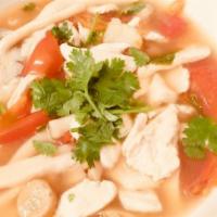 SP1. Tom Yum Soup · Spicy and sour soup with chicken, mushroom, lemongrass, tomato, onion, cilantro, scallion, l...
