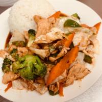 SF10. Spicy Hunan · Spicy Hunan sauce stir fried with broccoli, cabbabe, carrot, bell pepper, mushroom served wi...
