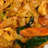 N2. Pad Kee Mao · flat noodle stir-fired with egg, basil, bell pepper, carrot, tomato, and onion with garlic c...