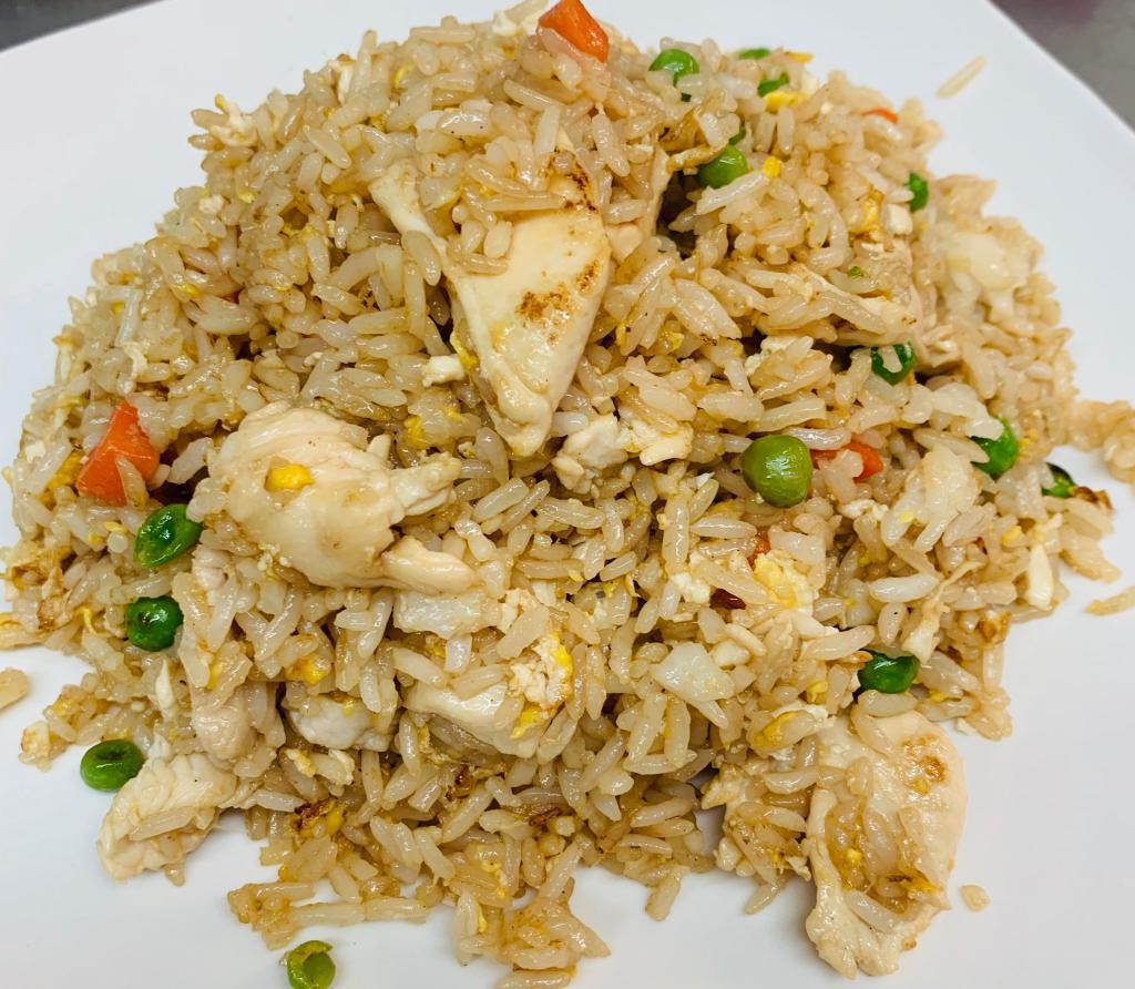F2. Chinese Fried Rice · Fried rice, egg, pea and carrot with light brown sauce.