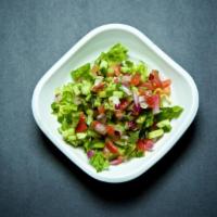 Shirazi Salad · Persian cucumber, tomato, red onion, parsley, mint, lemon, and olive oil.
