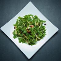 Kale Salad · Kale, pine nuts, apples, cranberries, and dressing.