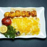 Boneless Chicken Kabob Plate · Charbroiled juicy chunks of marinated chicken. Served with rice, charbroiled tomato, salad, ...