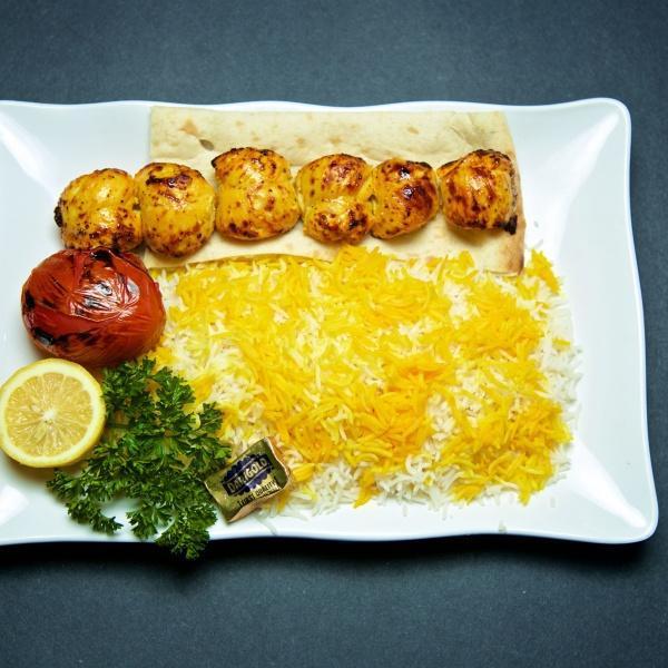 Boneless Chicken Kabob Plate · Charbroiled juicy chunks of marinated chicken. Served with rice, charbroiled tomato, salad, and bread.