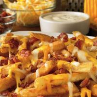 Bacon Cheese Fries · French fries with melted cheddar and chopped bacon on top.