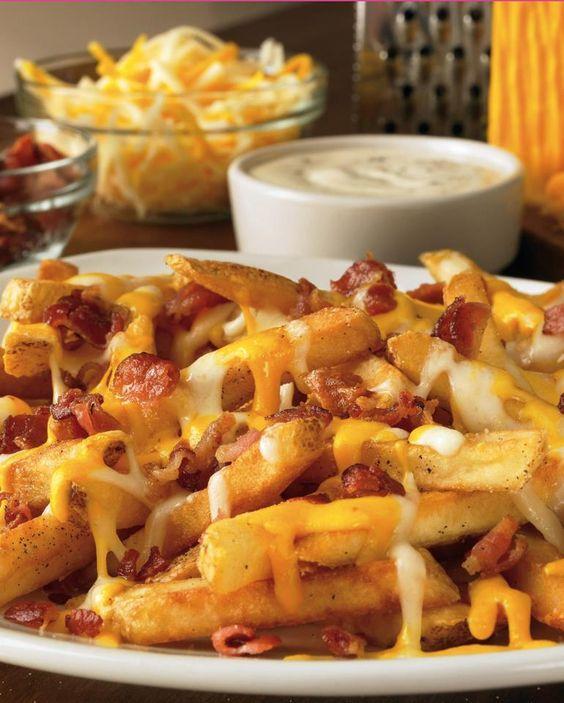 Bacon Cheese Fries · French fries with melted cheddar and chopped bacon on top.
