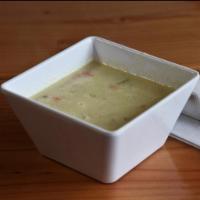 Chicken Lemon Soup · Creamy lemon soup with chopped chicken, rice and egg served with pita bread.