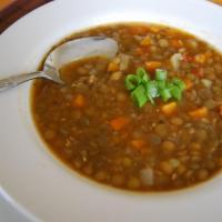 Lentil Soup · Classic lentil soup served with pita bread.