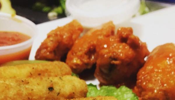 Buffalo Wings · Served with blue cheese.