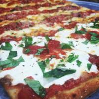 Sicilian Grandma Pizza · Nine slices. Thin crust Sicilian style pizza with marinara sauce, fresh garlic, and mozzarel...