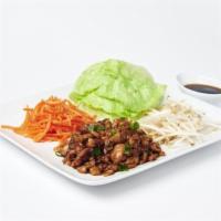 Asian Lettuce Wraps · 4 pieces. Crisp lettuce with minced chicken, mushrooms, water chestnuts, and green onions, g...
