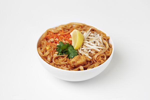 Pad Thai · Gluten free. Rice noodles in our tangy Pad Thai sauce with green onions, carrots, egg, peanuts and bean sprouts.