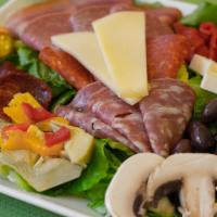 Antipasto Salad · Salami, prosciutto, pepperoni and provolone cheese on a bed of lettuce and olives.