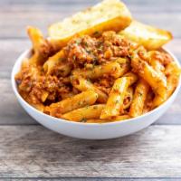 Vegan Bolognese Penne · Soy meat, celery, onion, tomato, carrot, penne, fresh garlic and herbs. Served with fresh ho...