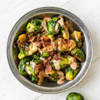 Maple Sriracha Crispy Brussel Sprouts · Fried extra crispy, these brussel sprouts are tossed in hot honey with crunchy chopped bacon...