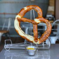 Beer Cheese Dip with Bavarian Pretzel · Soft jumbo pretzel, crispy brown on the outside and fluffy on the inside. Served with our fa...