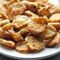 Fried Pickles · These are addictive! Lightly-fried and served with our Cyclone sauce for dipping.