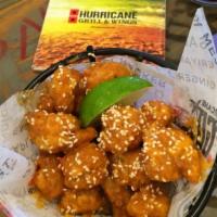 Firecracker Shrimp · Lightly-fried shrimp tossed in our sweet and spicy Firecracker sauce. Finished with sesame s...