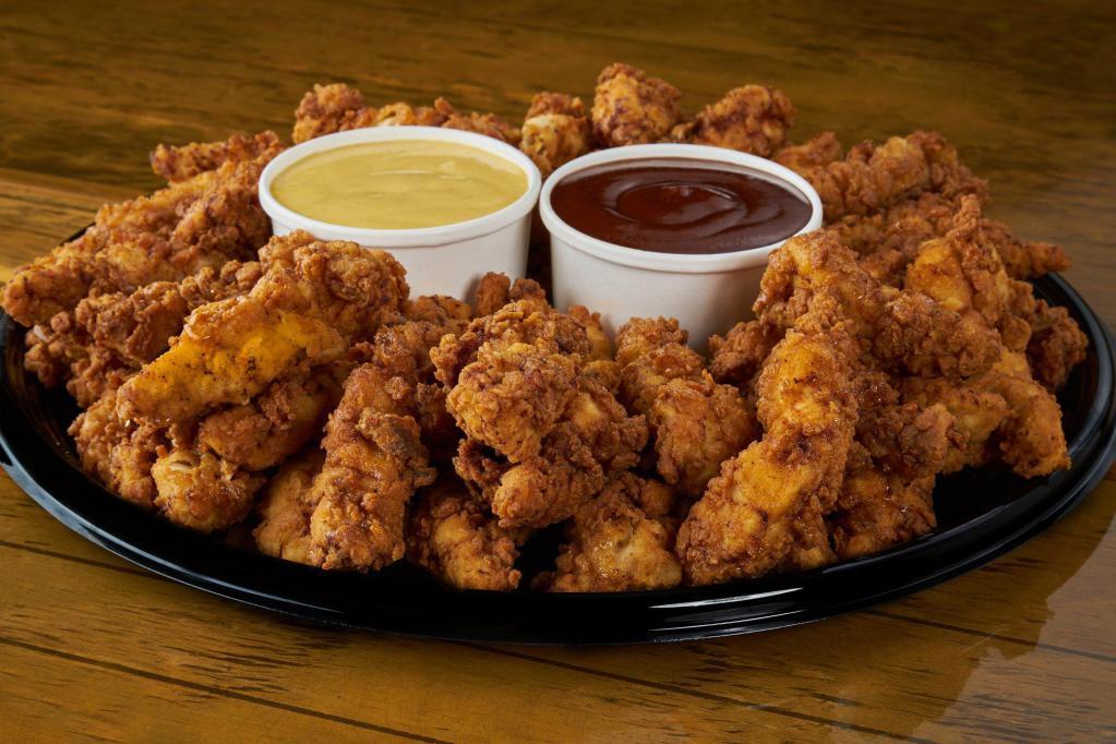 Chicken Tenders · Fresh, buttermilk marinated, hand-breaded chicken tenders with your choice of two sauces for dipping.