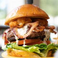 MacDaddy Burger · A truly epic half-pound burger featuring our signature all-beef patty, fried mac n cheese bi...