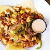 Fajita Rice Bowl · Mesquite grilled chicken, cheddar jack cheese, grilled peppers and onions over cilantro lime...
