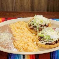 2 Sope Combo Plate · Choice of meat, beans, lettuce, cheese, and sour cream. Served with rice and beans.