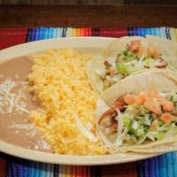 Fish Taco Plate · 2 breaded tilapia fish tacos with lettuce, guacamole, and pico de gallo served with rice and...