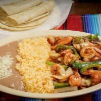 Shrimp Fajitas · Served with rice, beans, lettuce, guacamole and corn tortillas.