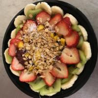 Tropical Fruit Acai Bowl · Organic acai, fresh strawberries, bananas, kiwi, jackfruit, almond granola, shredded coconut...