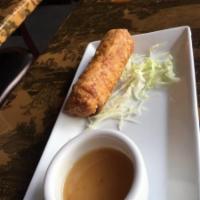 Chinese Egg Roll · Stir-fried cabbage, carrot, celery and chicken wrapped in wonton skin; battered and deep-fri...