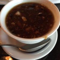 Hot and Sour Soup · Chicken, egg, bamboo, black mushrooms and tofu in a savory, tangy broth.