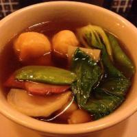 Wonton Soup · Shrimp wontons, pork, shrimp, chicken, snow peas, bok choy and napa cabbage in a sesame soy ...