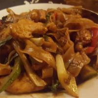 Thai Drunken Noodles · Flat rice noodle, chicken, baby corn, celery, bell peppers, onions, garlic, Thai basil and T...