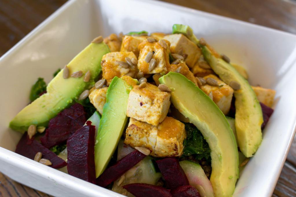 The Nature Bowl · Organic quinoa, shredded kale, roasted beets, cucumbers, sunflower seeds, avocado, grilled tofu, and topped with sesame ginger dressing. Vegetarian.