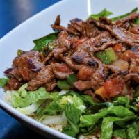 Steak Salad · 6 oz. grilled steak, tomato, onion, pepper marinated in low sodium teriyaki sauce, over lett...