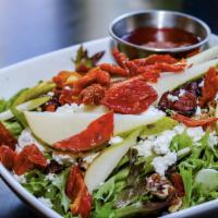 Nature's Grill Pear Salad · Mesclun greens, dried cranberries, walnuts, sun-dried tomatoes, goat cheese and sweet pear t...