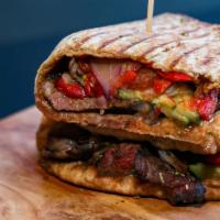 The New Yorker Panini · 6 oz. steak with zucchini, red onions, mozzarella cheese and roasted peppers.