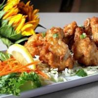 Best Thai Wings · Fried free range chicken wings and served with sweet honey sauce.